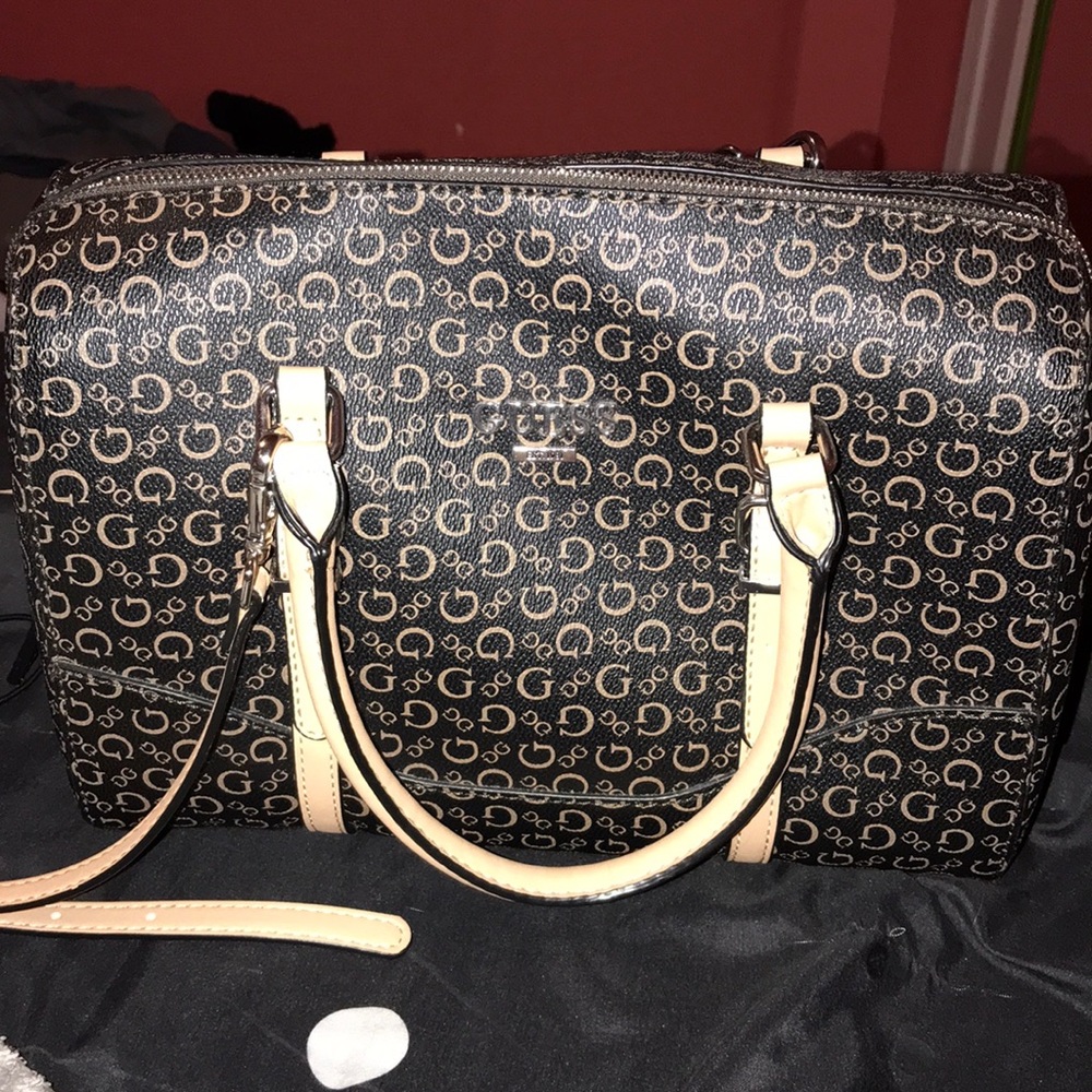 Guess Tote with matching wallet.